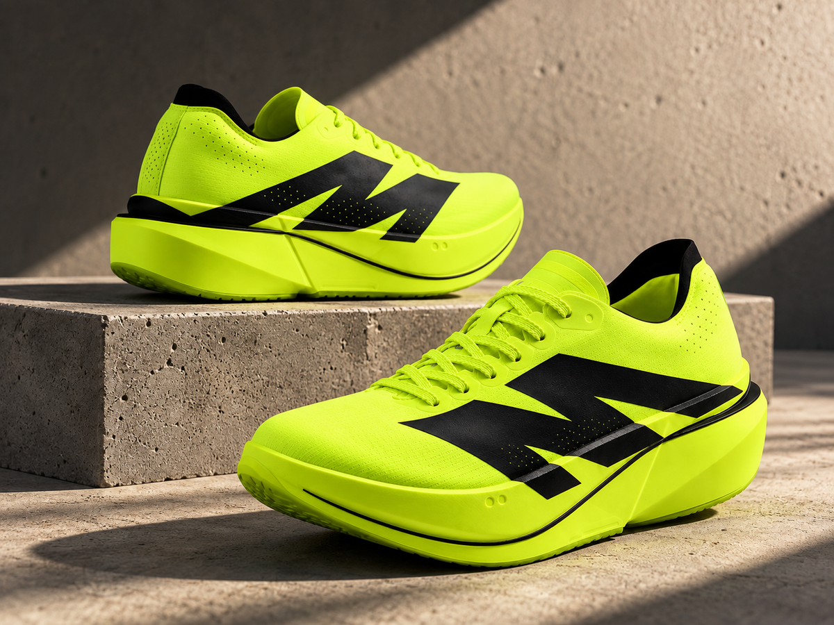 Pair of AURORO MOVE running shoes in Volt neon green on concrete steps